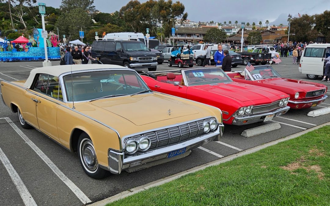 Car Buffs Defy Elements to Drive VIPs in Festival of Whales Parade